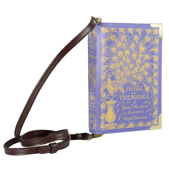 Voluptuous VIntage's large Pride and Prejudice bag by Well Read Company. A pale purple bag in the shape of a hardback book, with gilt title detailing. The strap attaches either end of the 