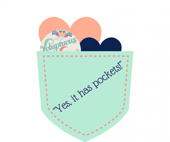 Yes, it has pockets!