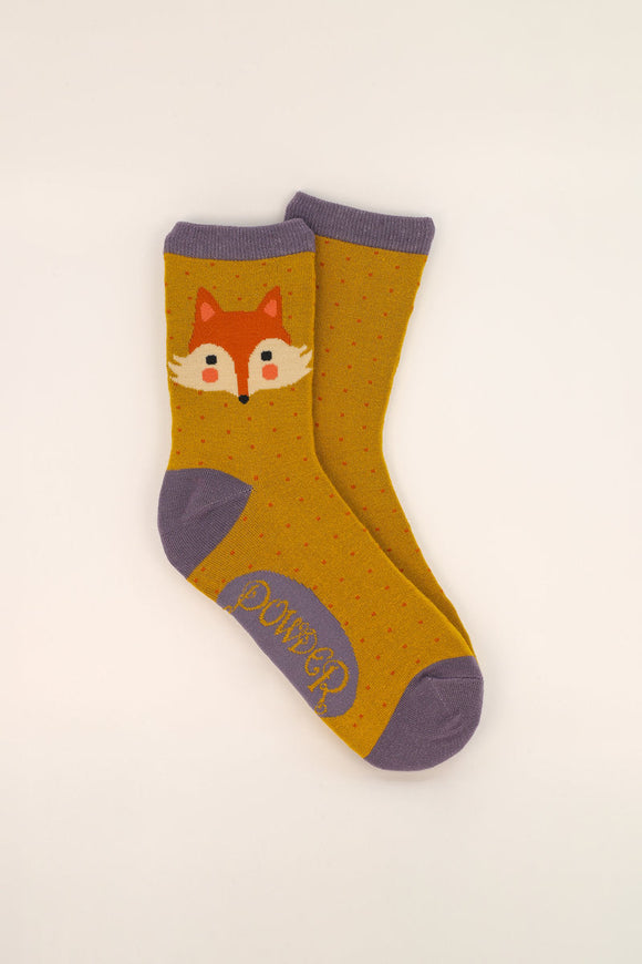 Cheeky Fox Face Ankle Socks -mustard colour socks with mauve contrast toe, heel and cuff, with tiny rust polkadots and a cartoon fox face at the ankle