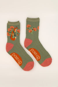Fox in a Meadow Ankle Socks - sage colour socks with contrast pink toe and heel,  rust coloured micro polka dots and a fox sat among pink blooms at the ankle