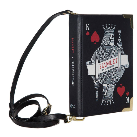 Voluptuous Vintage Hamlet Book Crossbody Handbag Small Bag by Well Read Company . A black book shaped bag with a playing card king illustration and Hamlet titling. The straps attach either end of the 