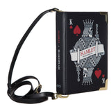 Voluptuous Vintage Hamlet Book Crossbody Handbag Small Bag by Well Read Company . A black book shaped bag with a playing card king illustration and Hamlet titling. The straps attach either end of the "spine".