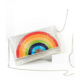 Voluptuous Vintage's Handbeaded Luxury Rainbow Clutch Bag By Ricki. A silver backgroud of solid bugle beads, with a shimmering rainbow arc beaded all the way across the front flapover. 