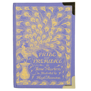 Voluptuous VIntage's large Pride and Prejudice bag by Well Read Company. A pale purple bag in the shape of a hardback book, with gilt title detailing. The strap attaches either end of the "spine"