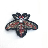 The fabulous Red Sparkly Insect Pin Brooch in  by Sixton London at Voluptuous Vintage