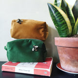 The fabulous Small Velvet Cosmetic Box Bag with Sparkly Insect Pin in  by Sixton London at Voluptuous Vintage