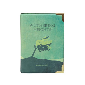 Wuthering Heights Green Book Crossbody Bag by Well Read Company. a bag in hues of green with windswept tree and bold title text. the strap attaches either end of the hardback "spine"